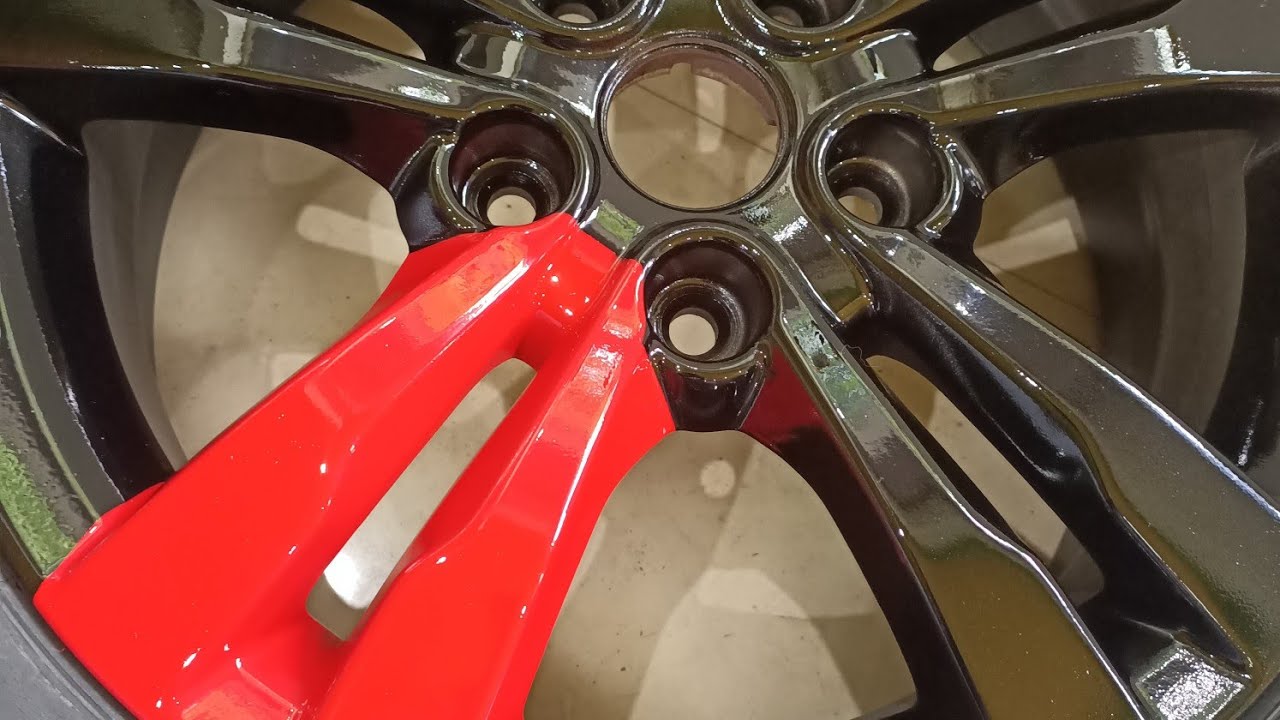 Brezza Alloy wheel painting black and red combination.