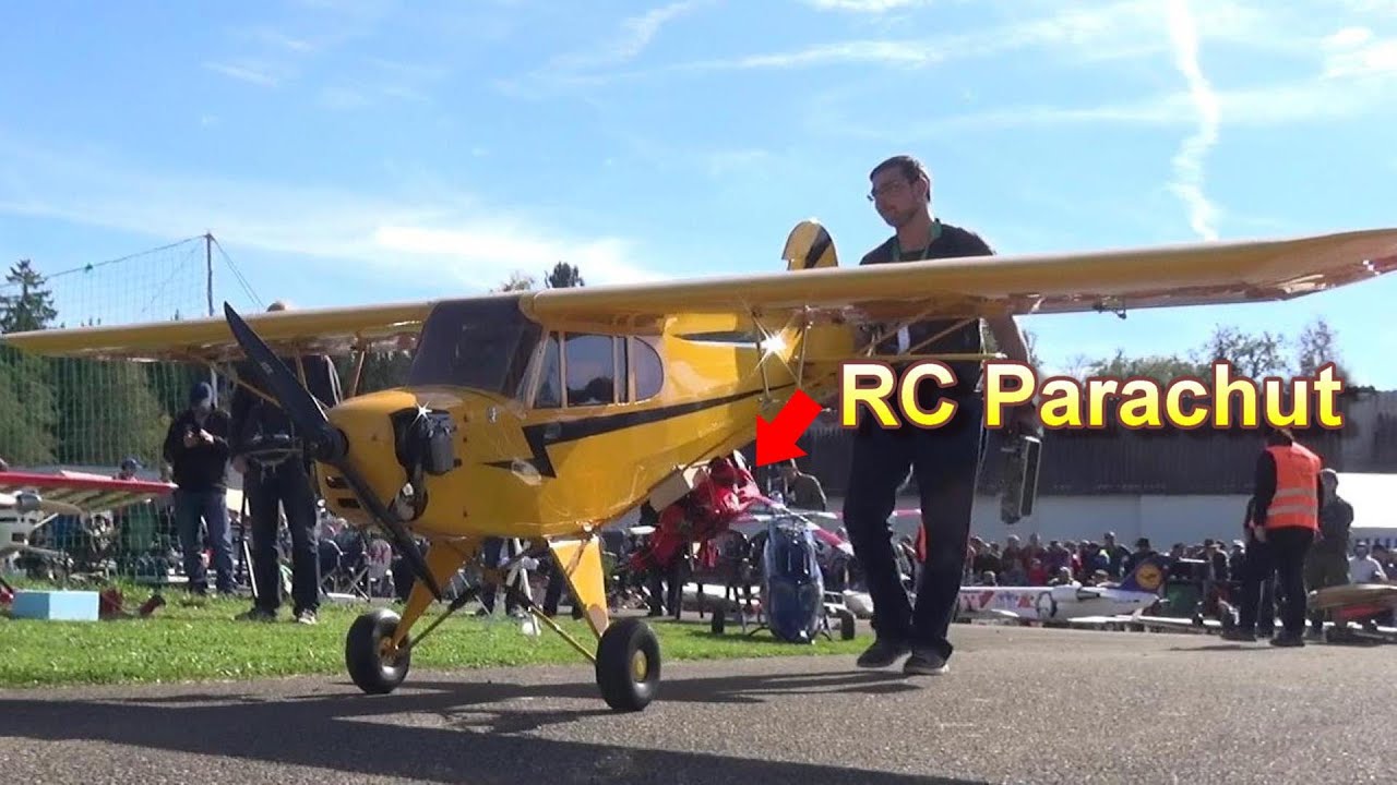 Multiple RC Parachut Jump Out a Giant Piper Cup J3 Radio Controlled