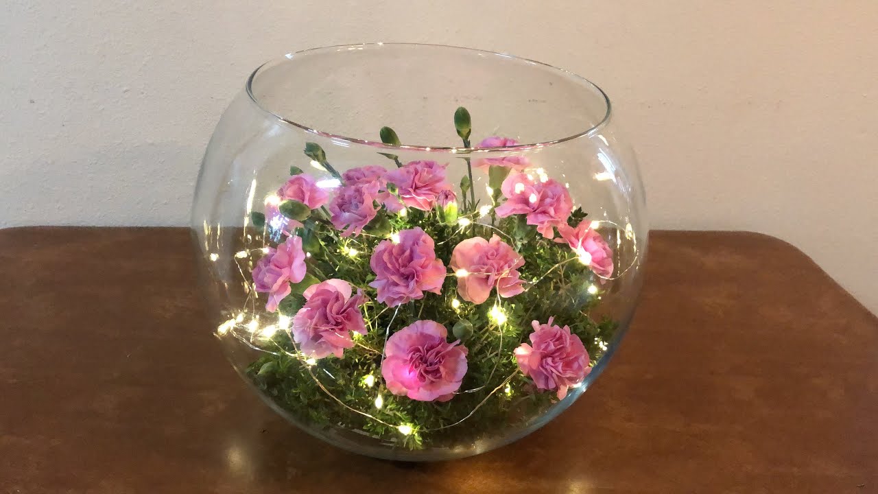 Centro de mesa en pecera #beautiful #floralarrangement #fishbowl