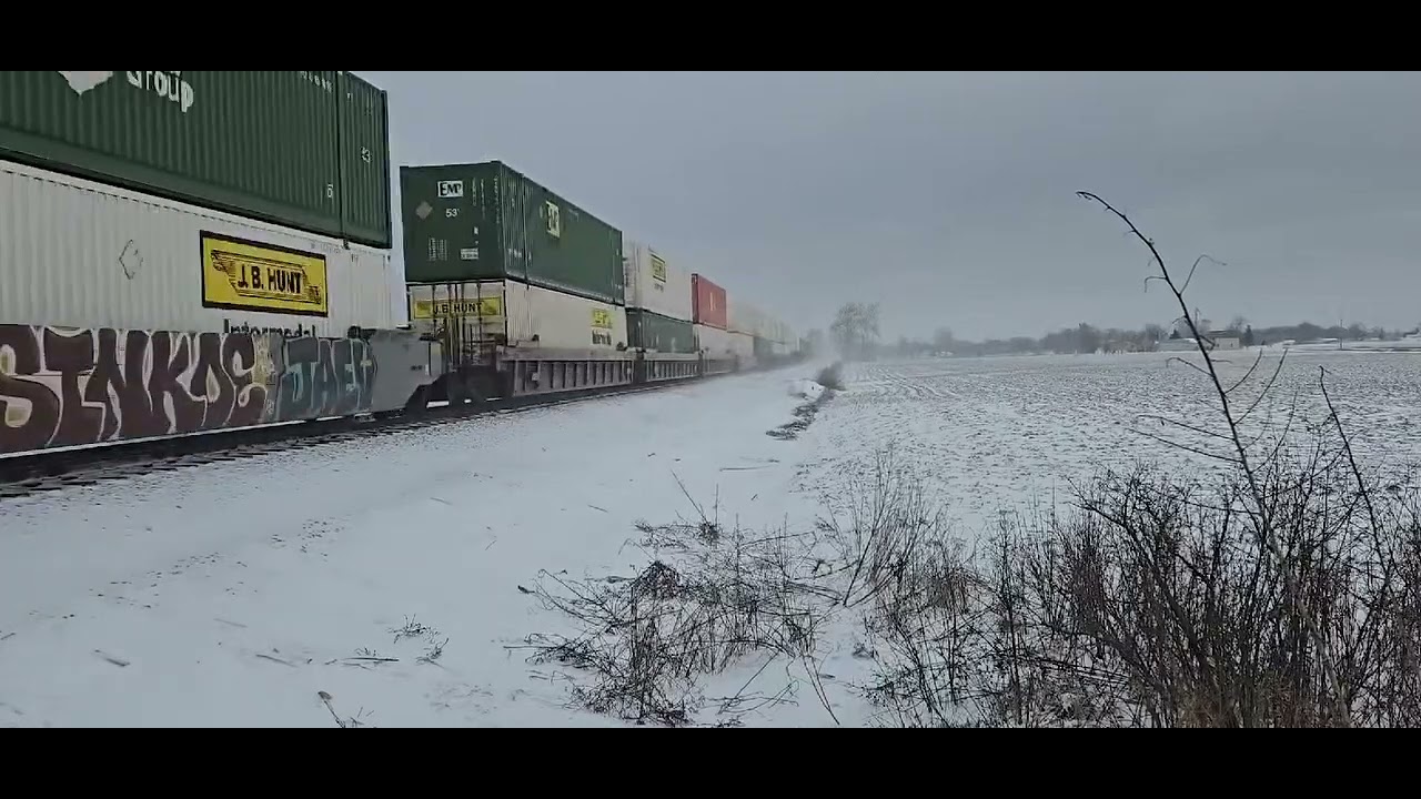 BNSF Led Intermodal in the blowing snow.