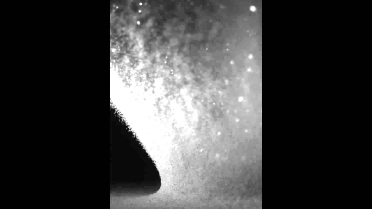 Hypervelocity impact experiment into sand at the NASA Ames Vertical Gun Range