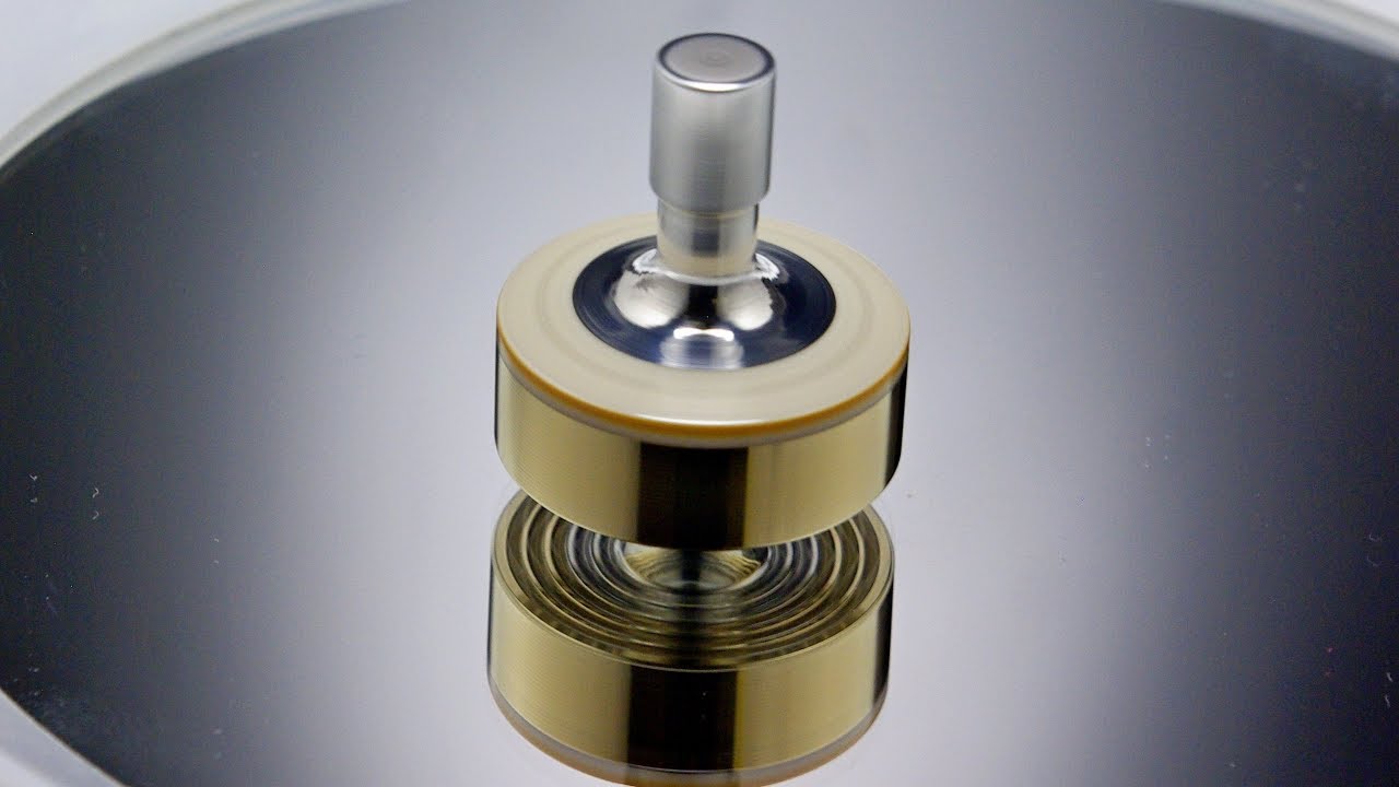 Spinning top with horn inlay by RadAXIS