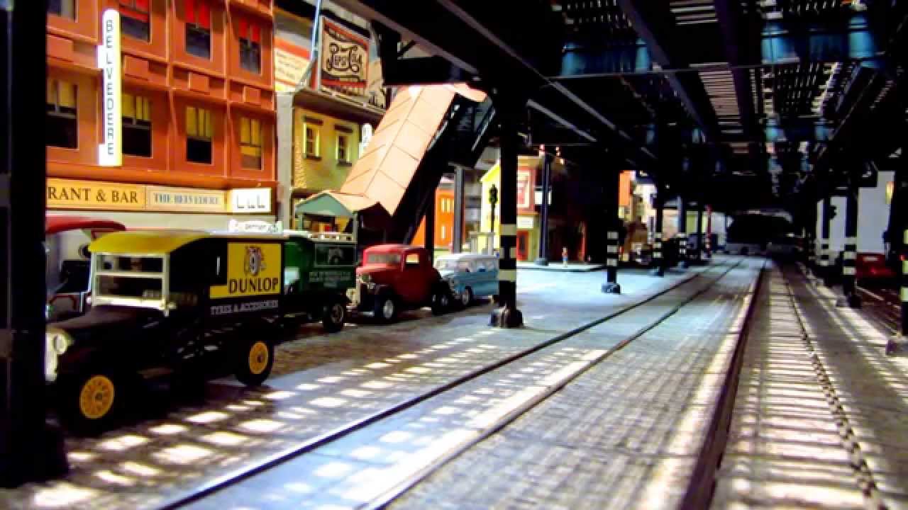 NYC Transit EL & SUBWAY - O-Scale EL Train above leaves EL station--MVI 0917