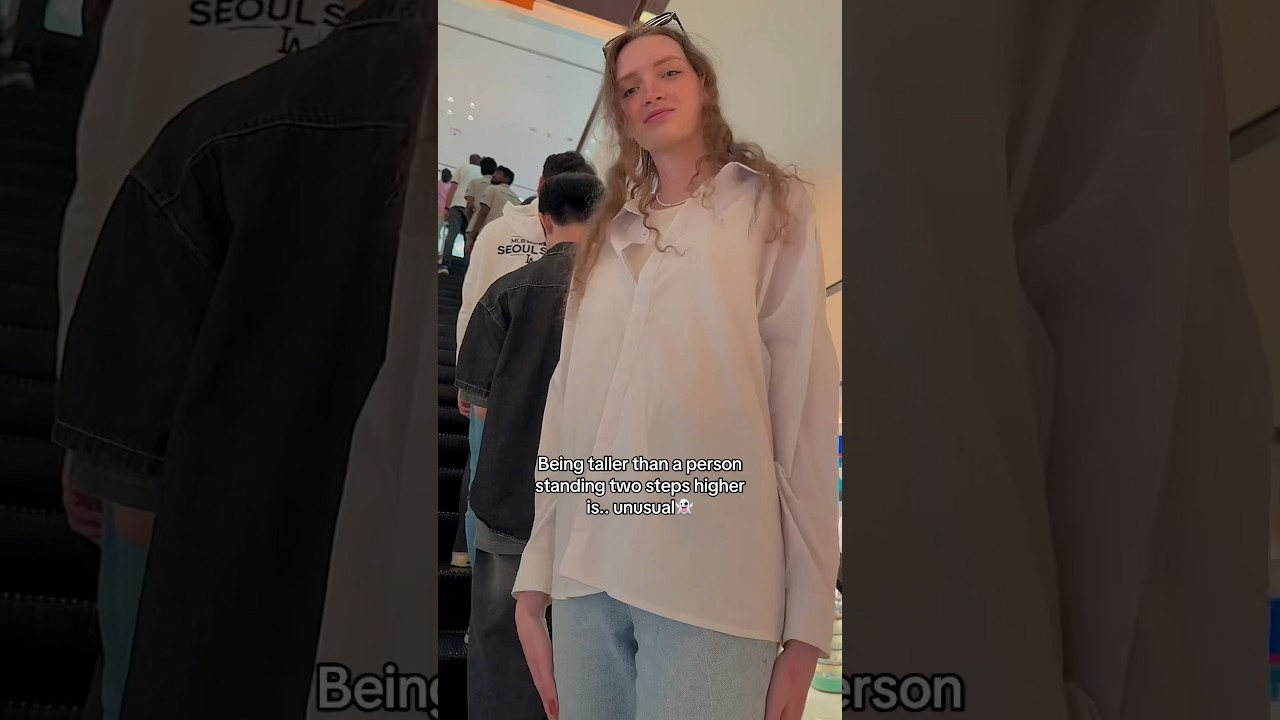 Tall Girl on the Escalator is Crazy #fypシ #trending #tallgirl #giant #height #public #reaction #cute