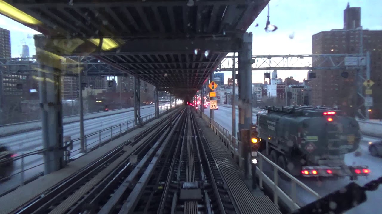 MTA J Train to Manhattan crossing Williamsburg Bridge - Front Window View