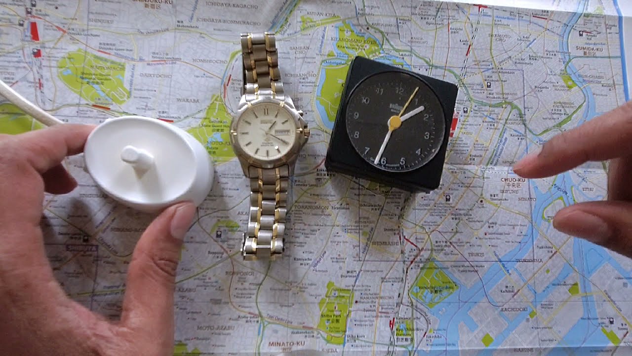 Charging  Dead Seiko Kinetic on Braun Toothbrush Charger Time-lapse