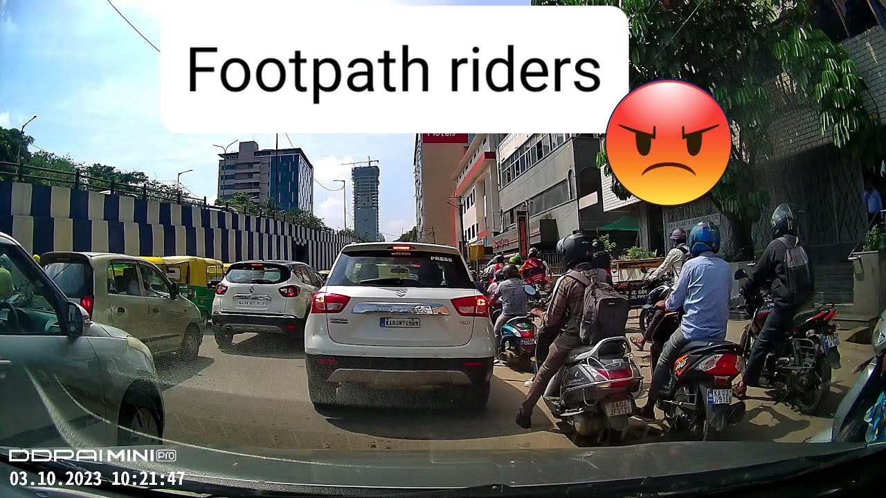 Footpath riders put pedestrian life at risk😡🏍 @Roadkingbengaluru