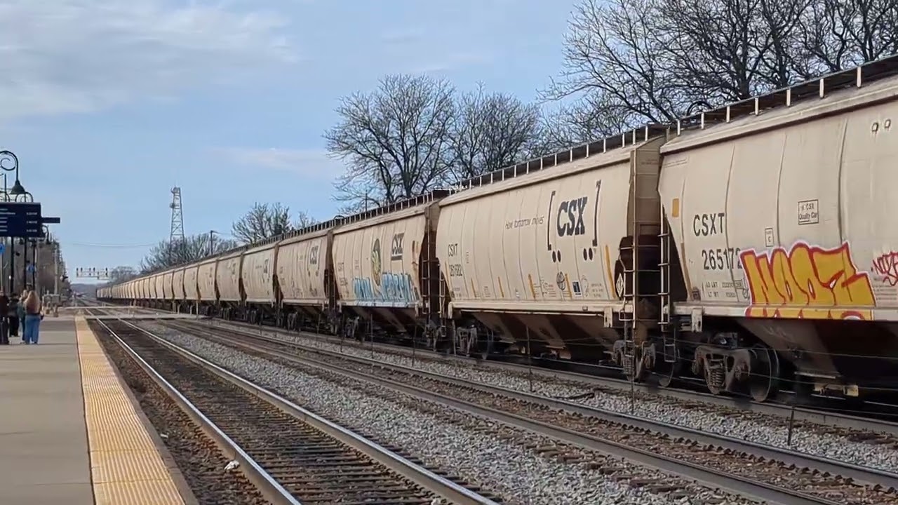 Westbound CSX Grain train on the racetrack with a Flared SD70M! 