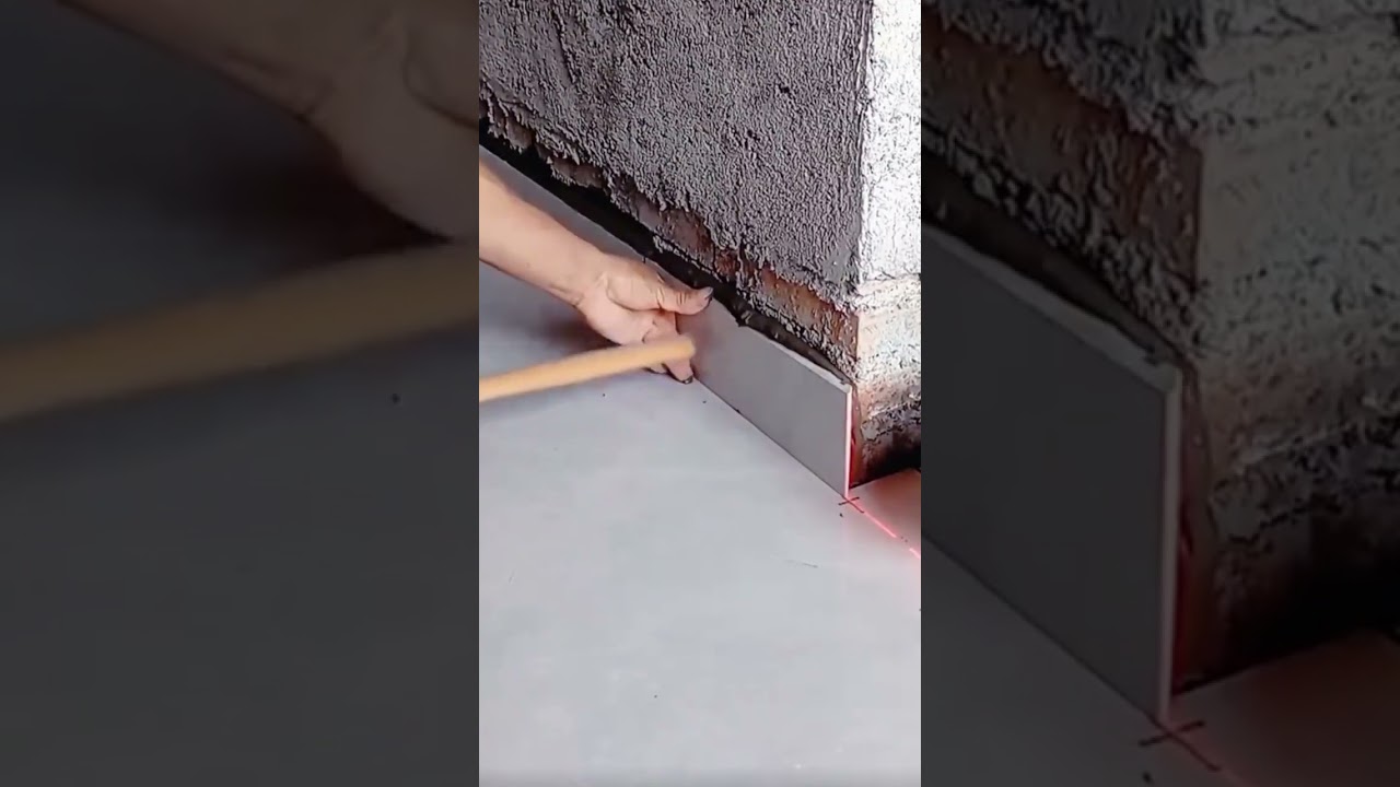 The process of installing small tiles to create a wall border in a room #popular #construction