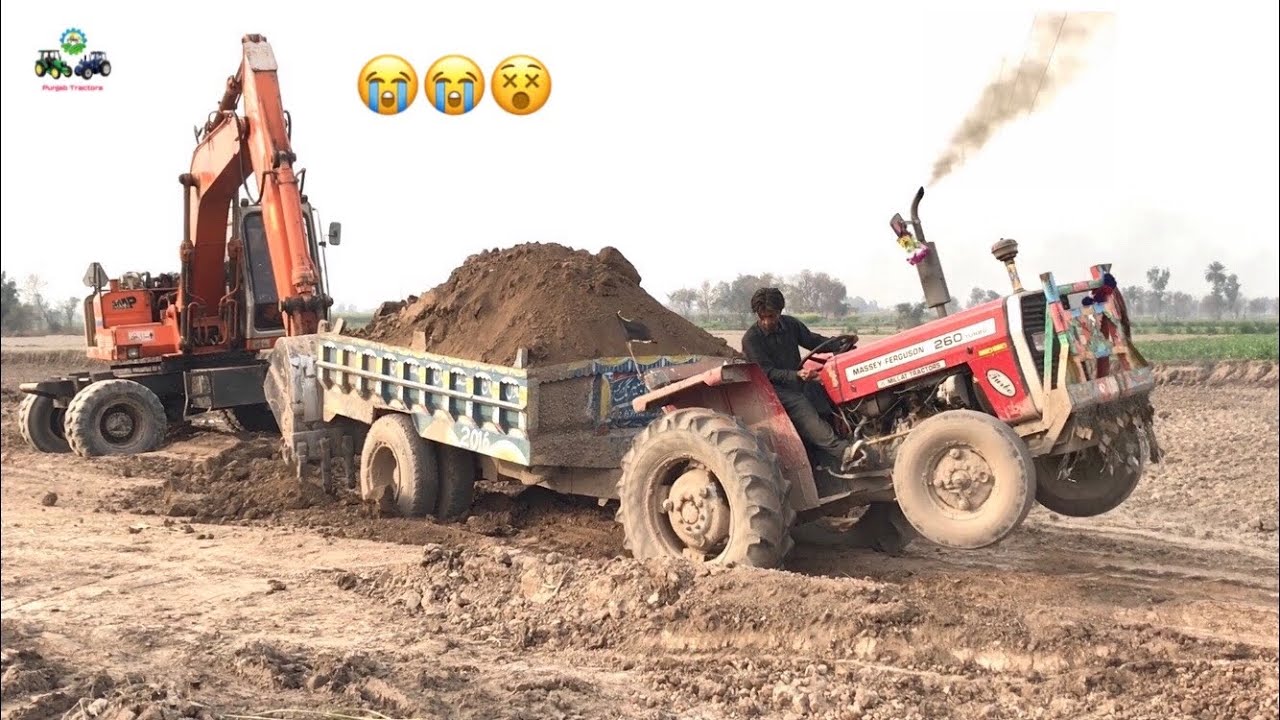 Massey Ferguson 260 Turbo Stucked with Soil loaded Trolley Rescue with Excavator Machine
