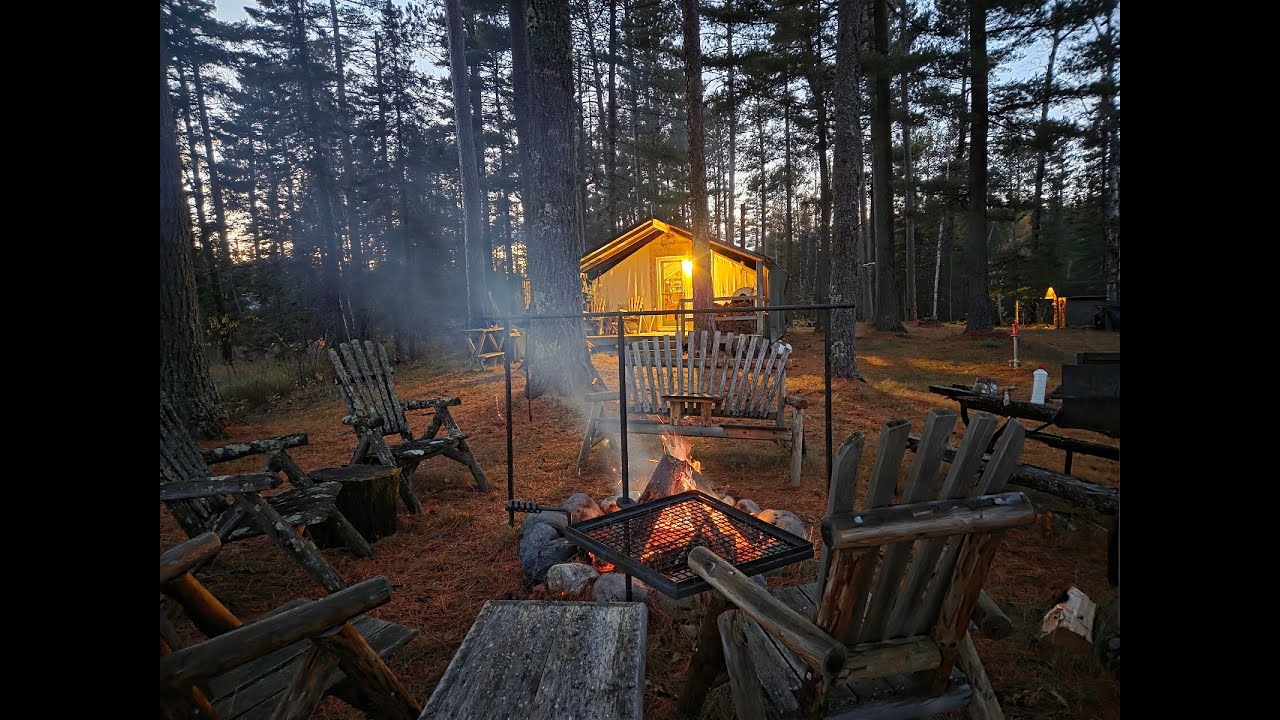 THE TENT. First fall trip. Firewood on the porch. Splitting wood. Deer stands.  Campfire cooking.