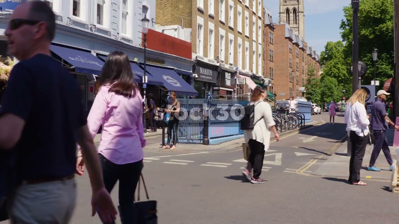People At Junction Of Talbot Road And Portobello Road In Notting Hill, London, UK