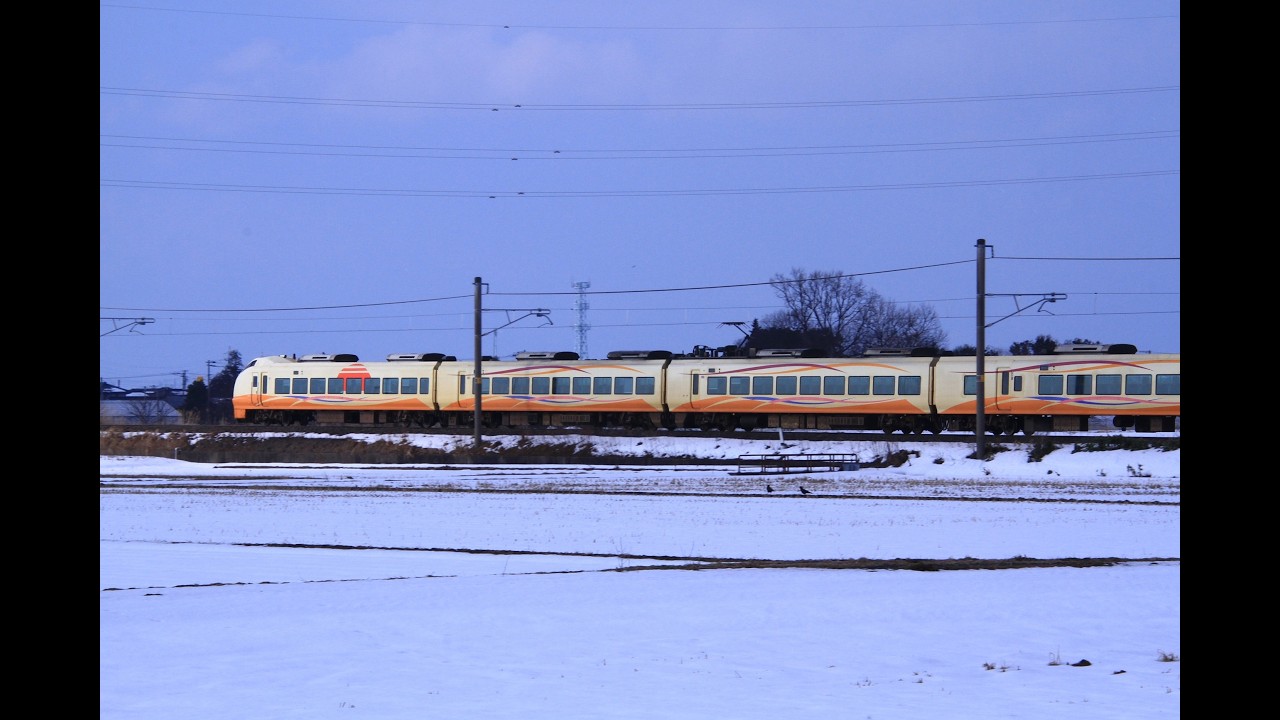 下黒山で白新線の雪景色を走る電車撮影