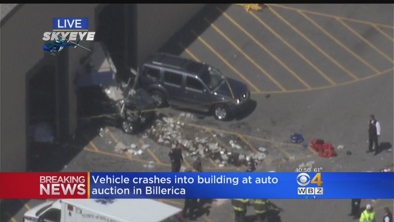 Several Injured After Vehicle Crashes Into Building At Billerica Auto Auction