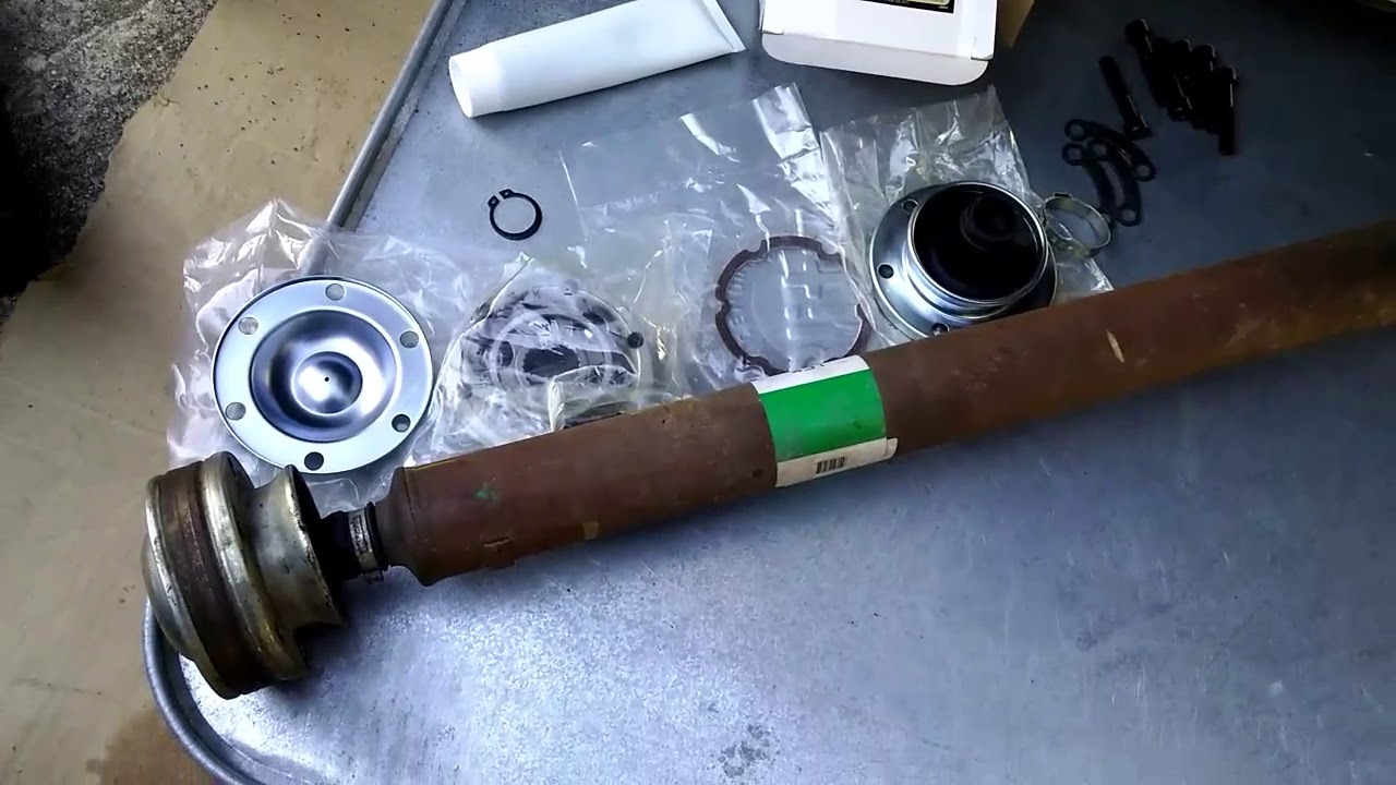 How to diagnose / replace bad CV Joint on front propeller drive shaft - Jeep 4x4 Quadra Drive 2