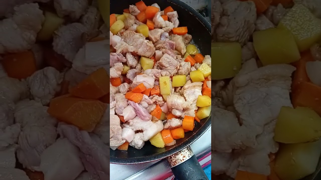 Cooking our menu for lunch pork menudo! 