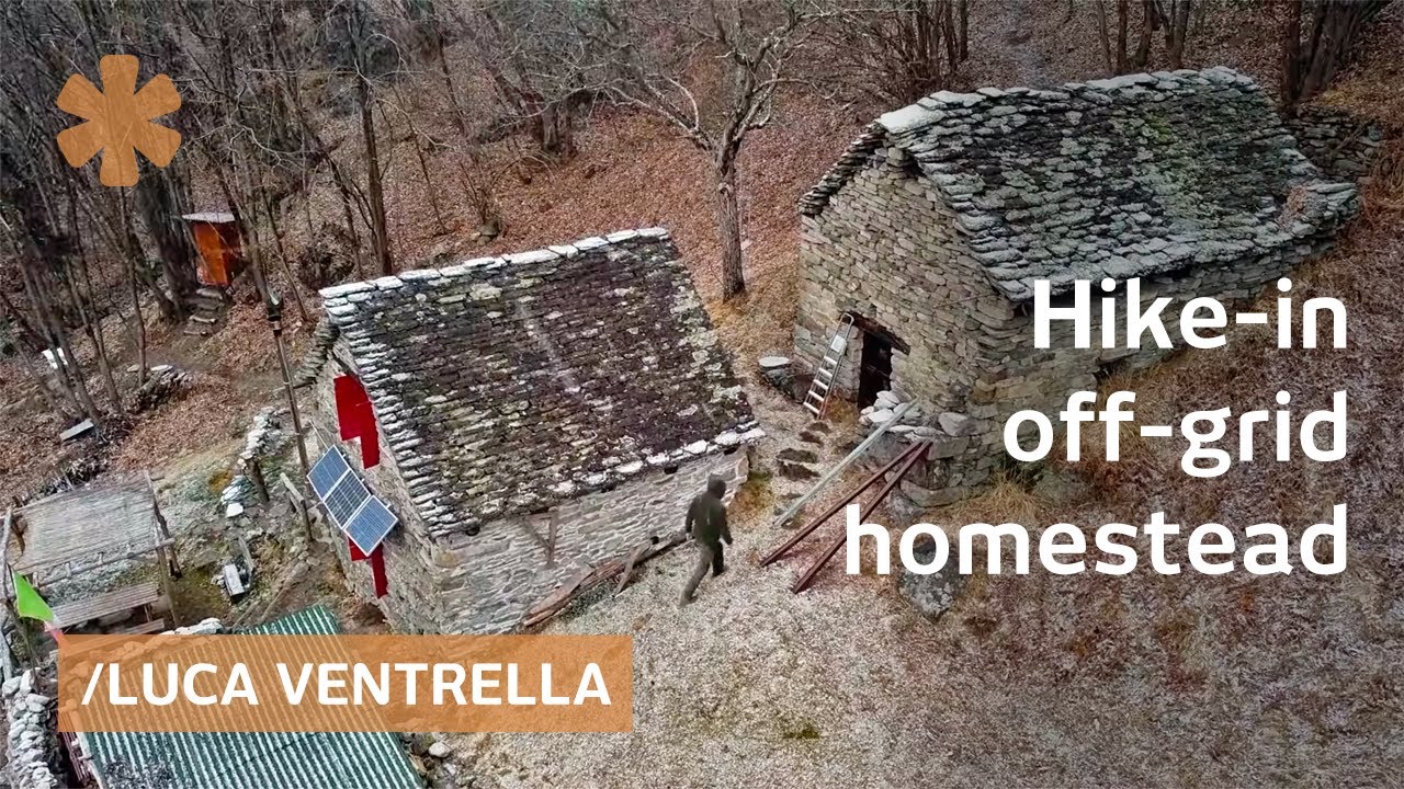 Rebuilds $8K remote ruin by hand alone: best water/solar so far