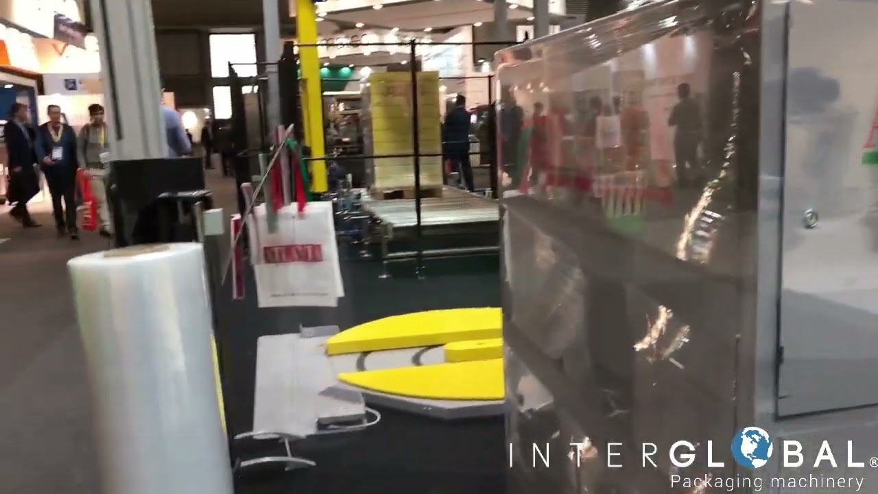 ENVOLVEDORA DE TARIMAS DE BRAZO ROTATIVO