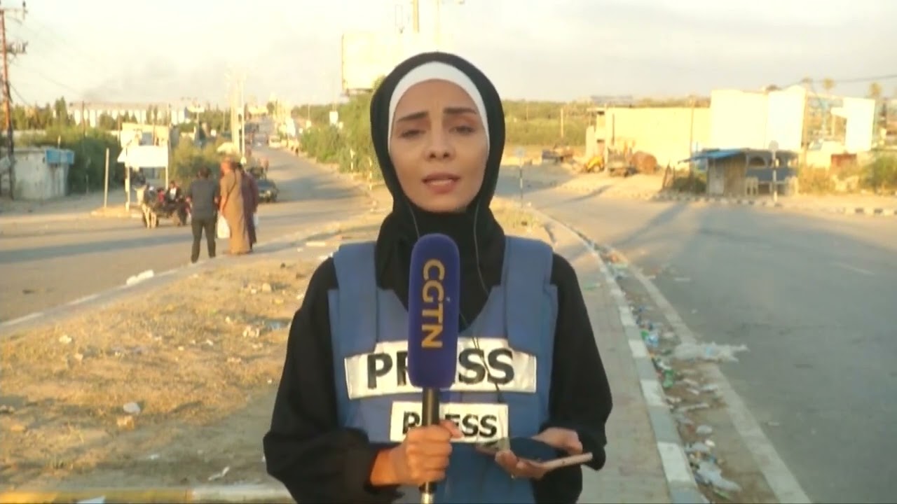 A Gaza health official says over 80 were killed on Saturday in twin strikes on a Gaza refugee camp