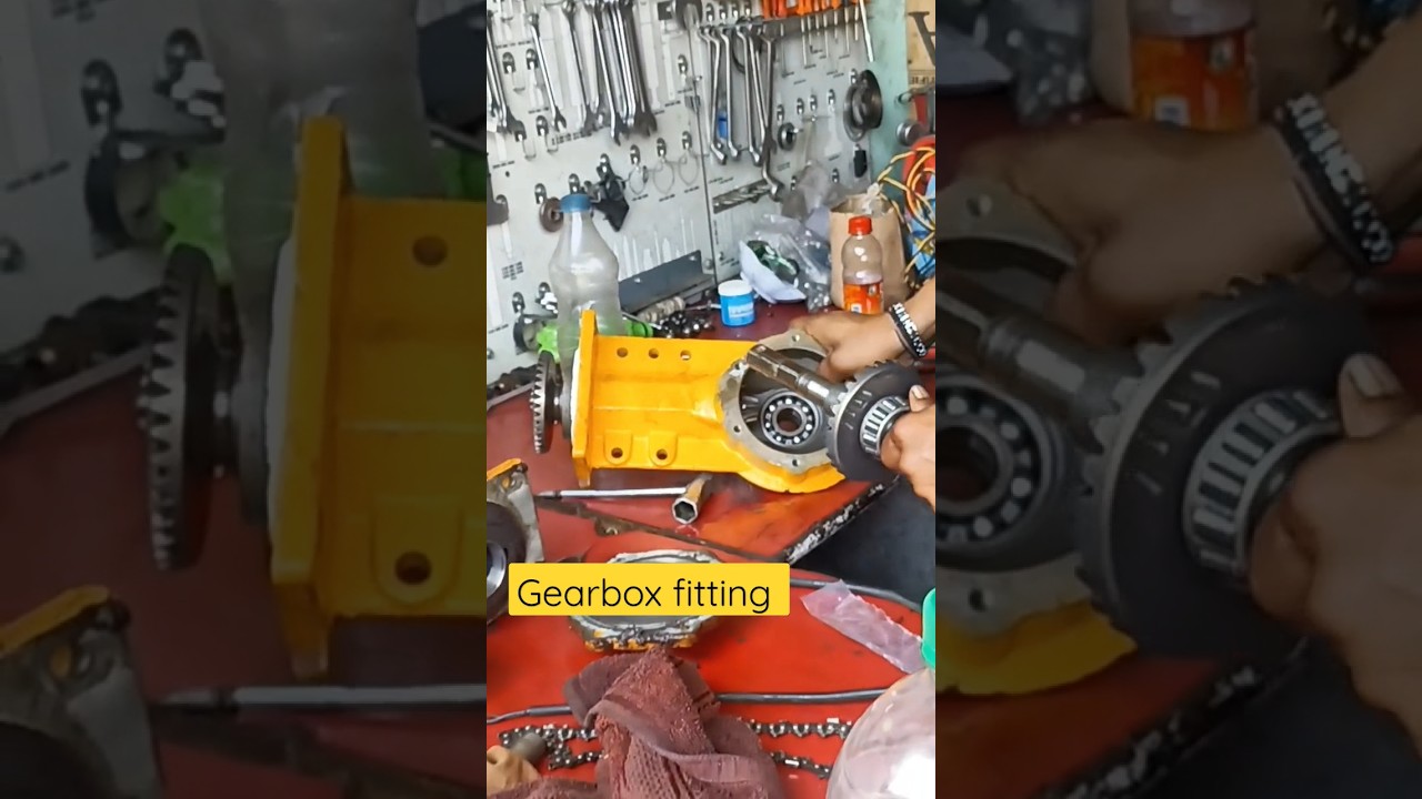 Gear box parts fitting in power tiller by professional