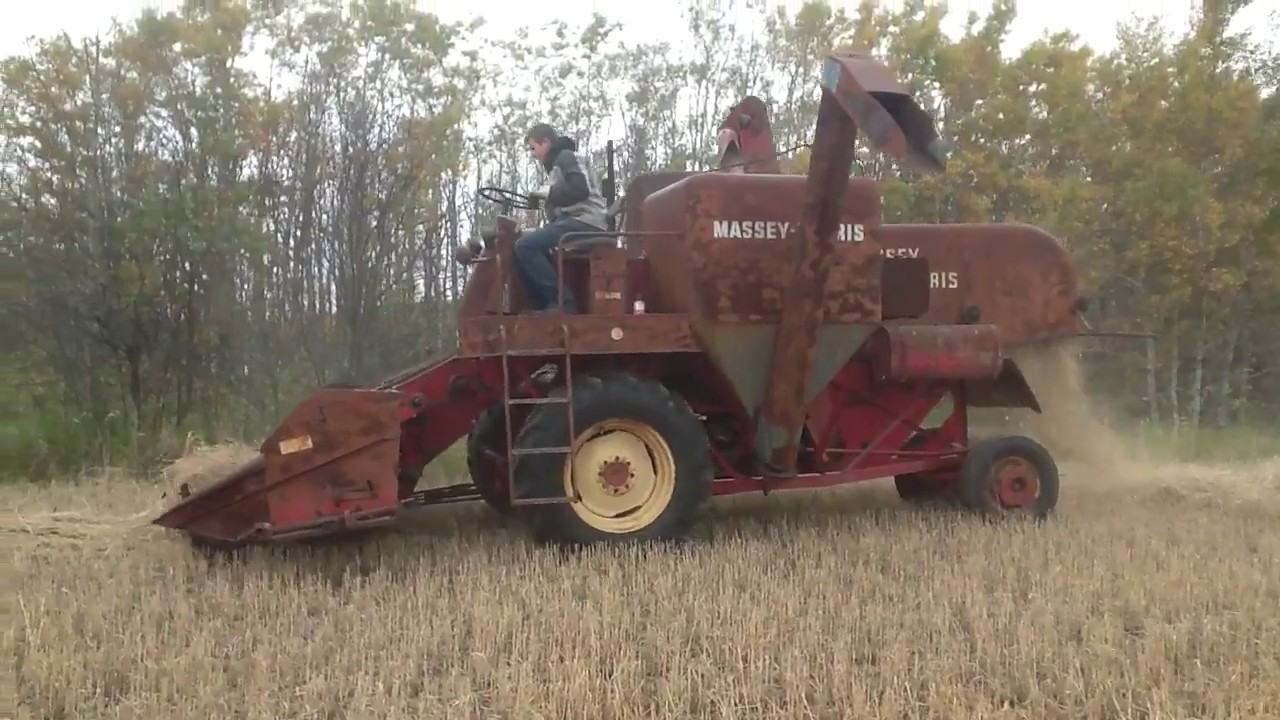 Massey Harris 90 combine with International WD-9 tractor