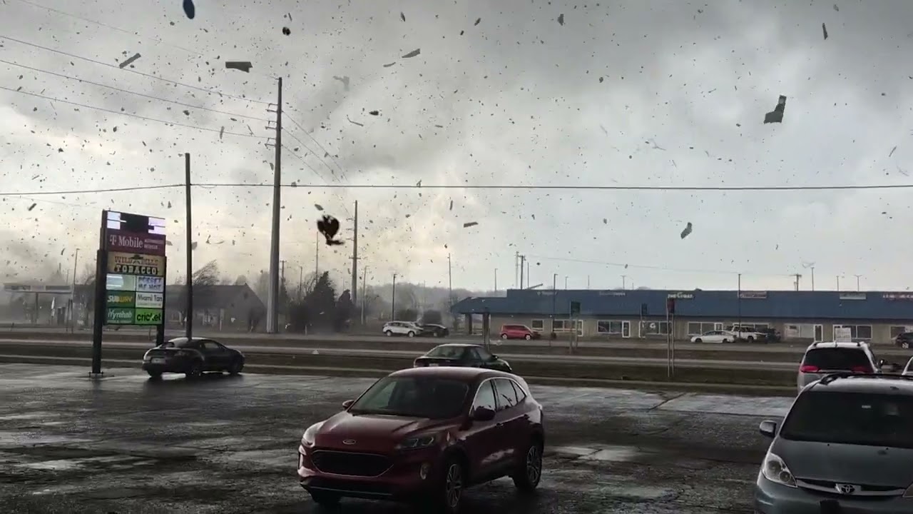 Tornado Sends Debris Flying in Front of Three Rivers Store