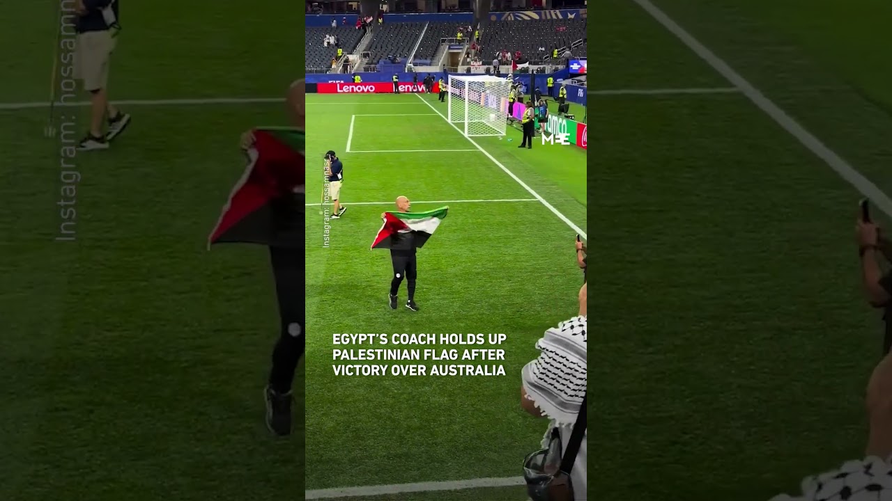 Egypt&rsquo;s captain holds up Palestinian flag after victory over Australia in World Cup