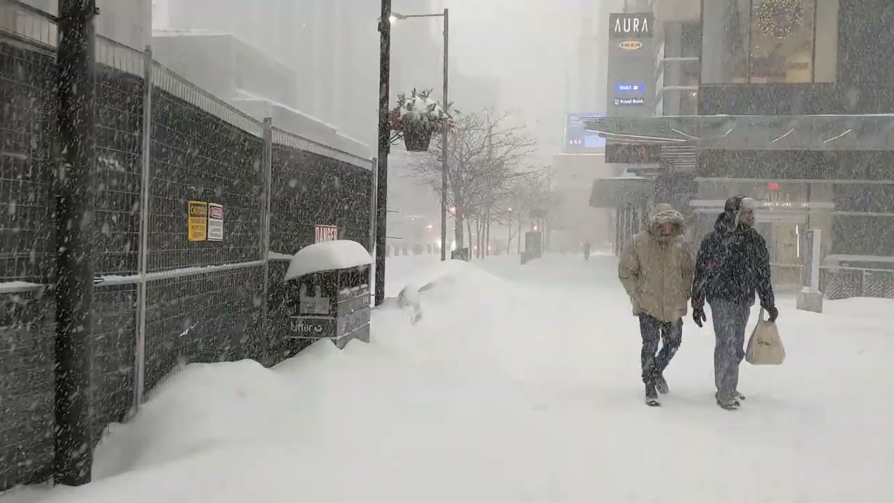 Walking in an insane snow storm in downtown #torontolife Toronto. Not recommended !  