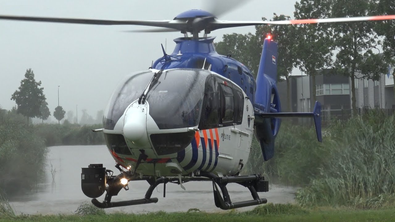 [ PH-PXE ] Politiehelikopter Police05 stijgt op vanaf Porsche Centrum Gelderland in Heteren
