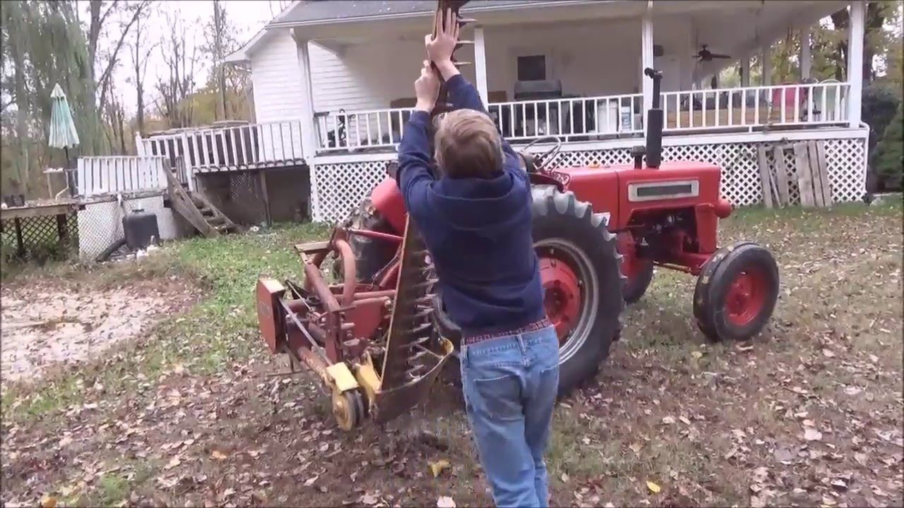 IH B414 Tractor Mowing