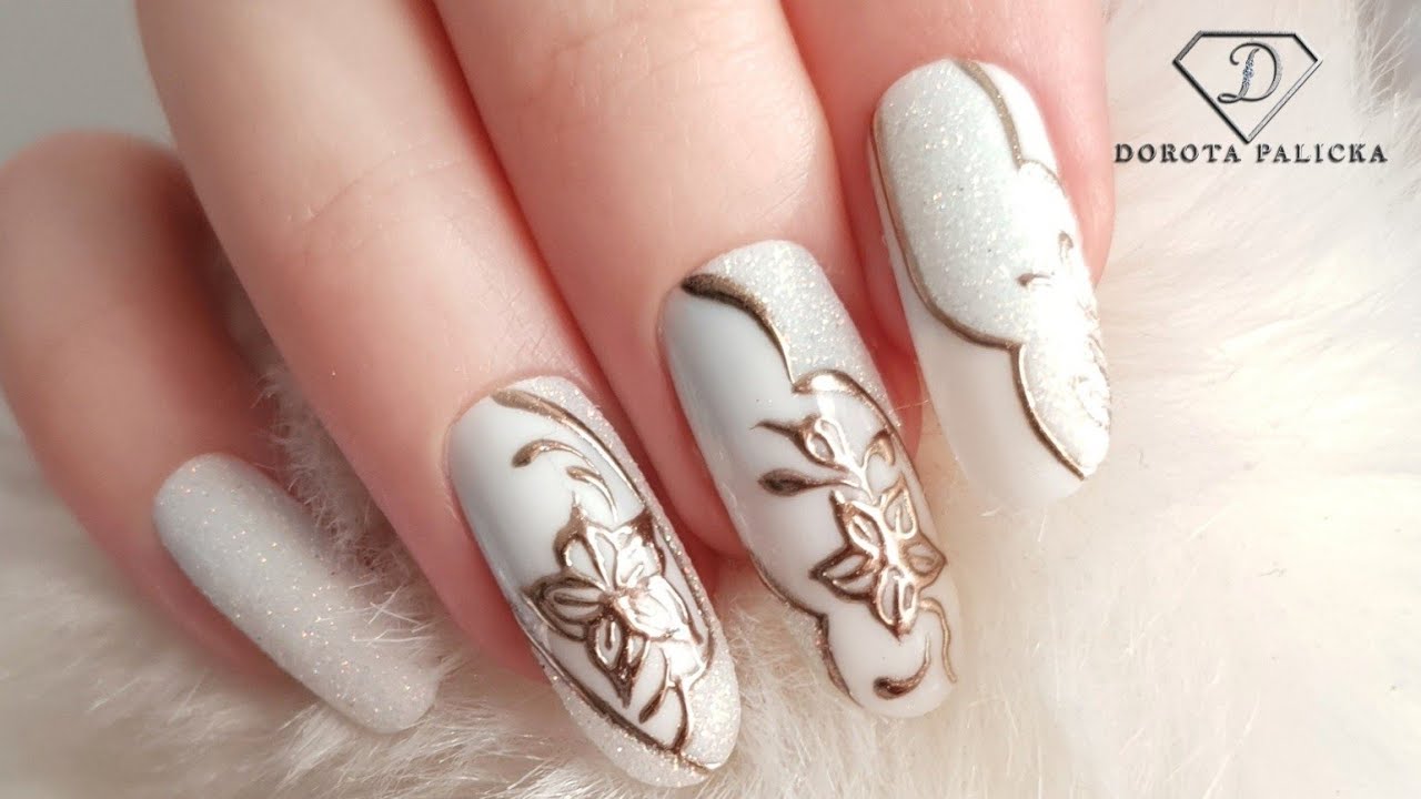 Chrome flower nail art with sugar glitter.