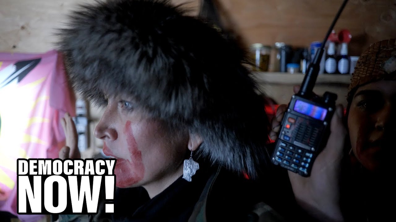 Dramatic Video Shows Militarized Canadian Police Raid Wet’suwet’en Land Defenders & Journalists