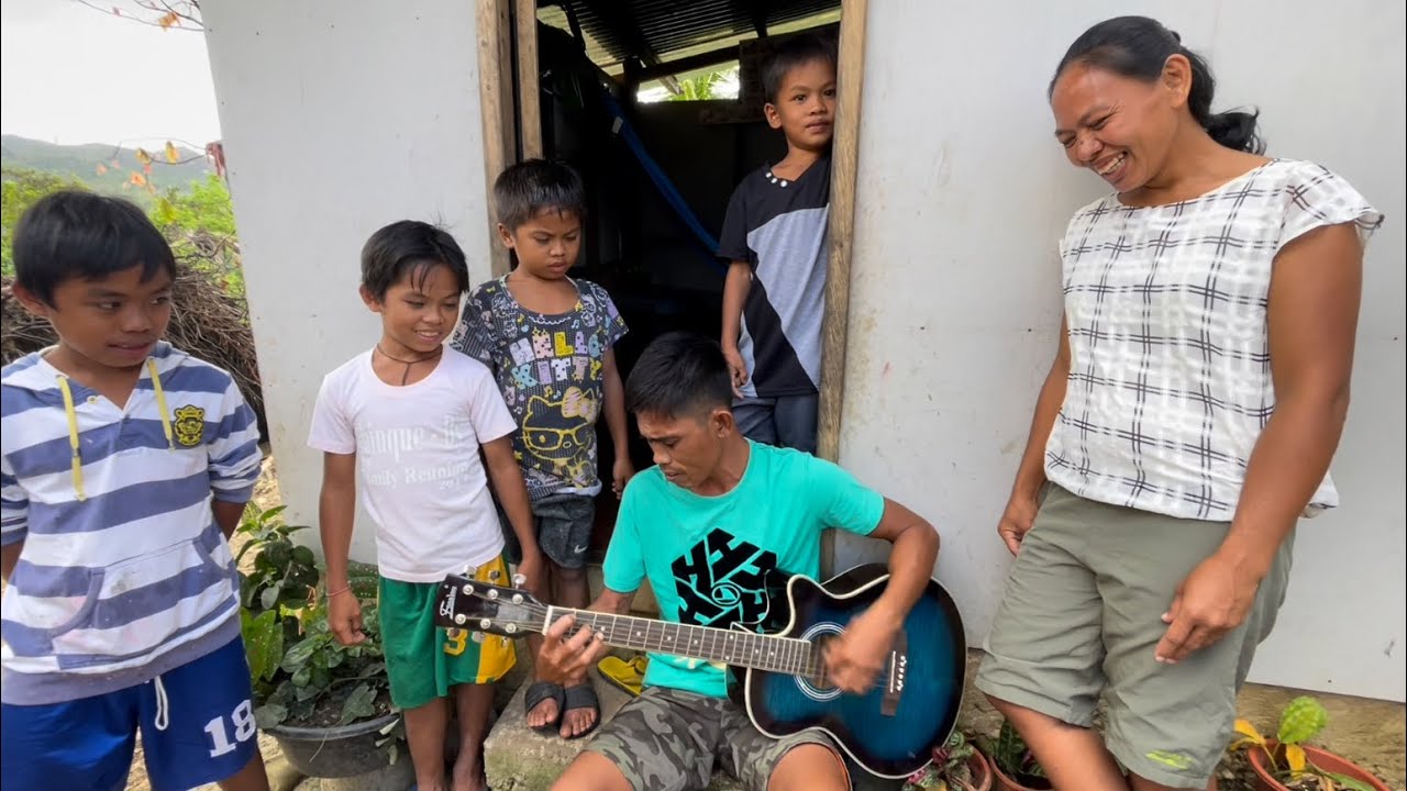Rebuilding after the typhoon - Jenis and Daisy's family - Jenis gives mini concert  ( MANY SONGS )