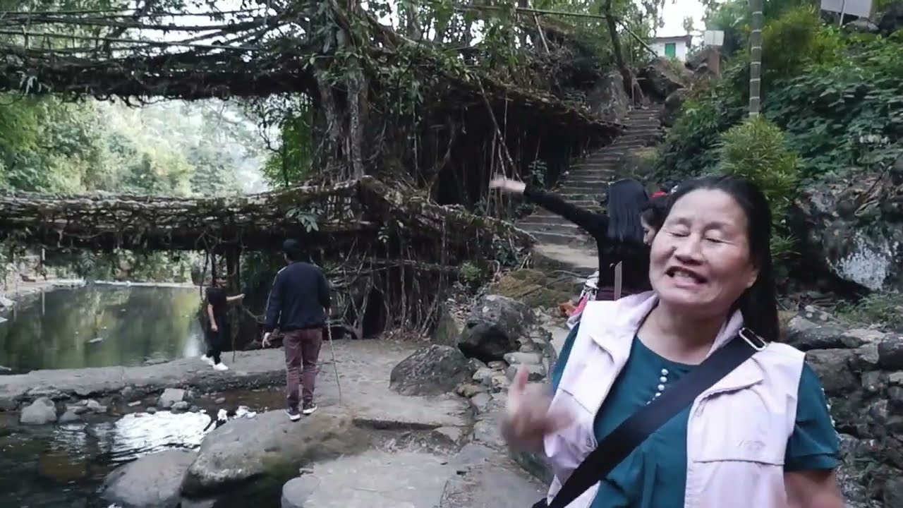 Double Decker Living Root Bridge (Sohra) with family