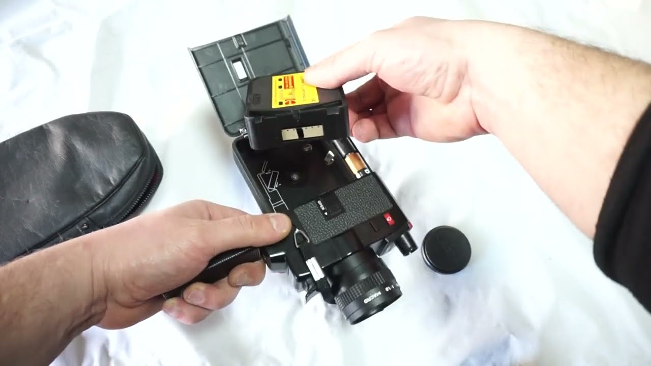 Canon 310 XL loading Super 8 film and batteries on Super 8 camera Canon 310 XL + film test
