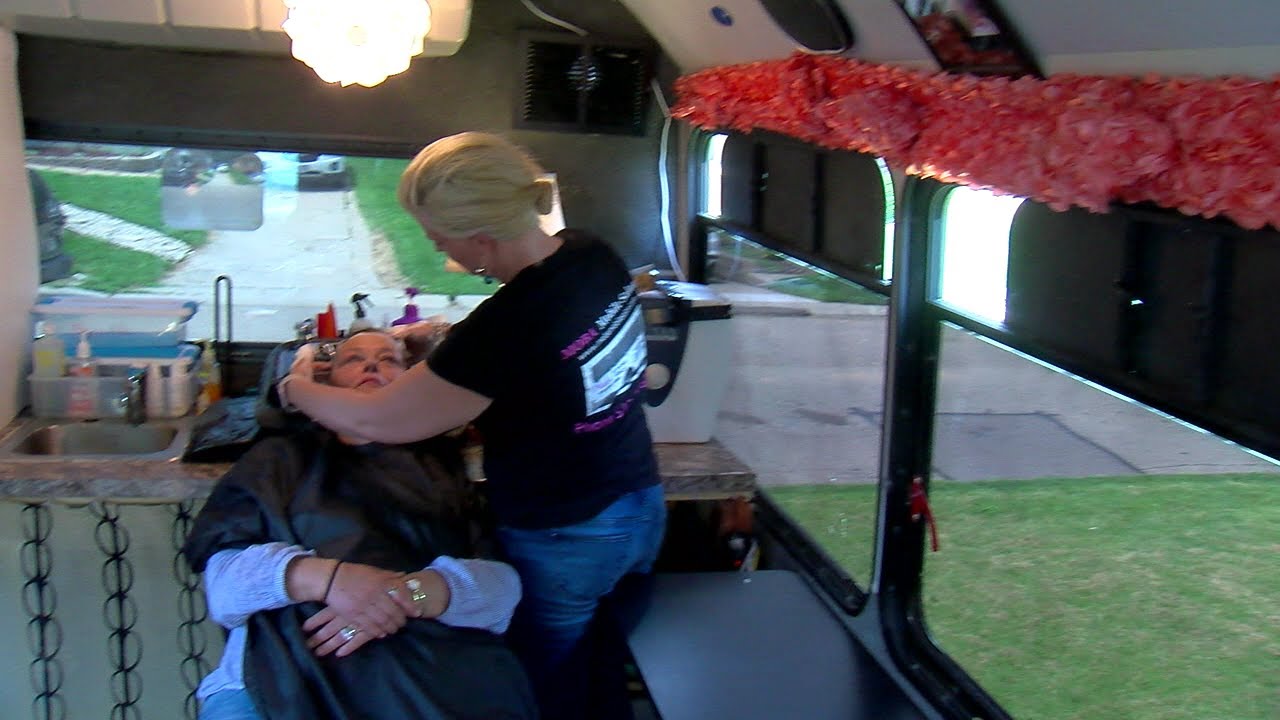 Couple turns passenger party bus into mobile hair salon