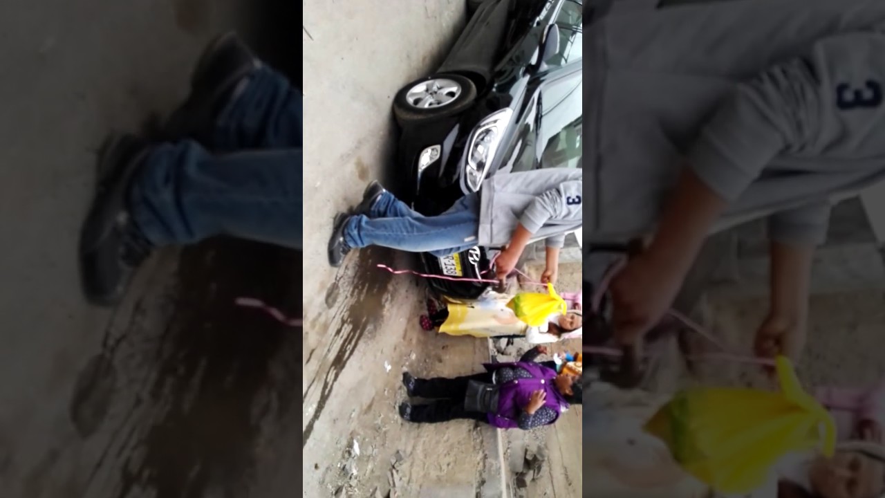 Bautizo del Carro de Alberto y Guillerma por el padrino Nelson