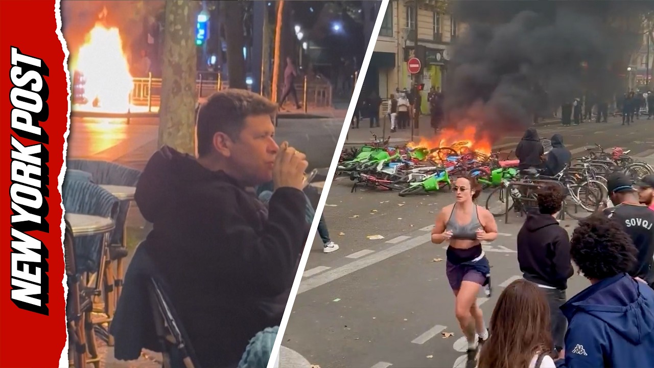 Unfazed Couple Enjoy Drinks as Violent Riots Rage Nearby in Paris