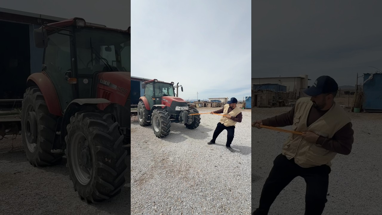 I'M GETTING THE BROKEN TRACTOR STARTED BY TOWING IT