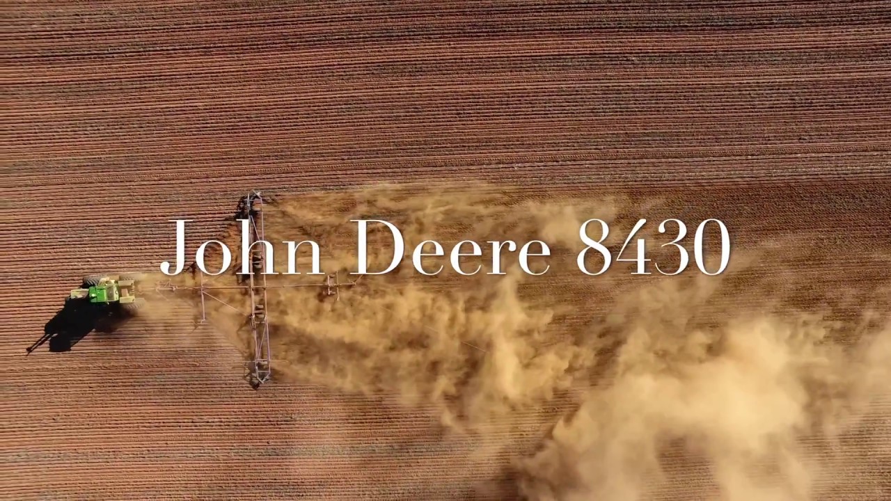 John Deere 8430 tractor working with a prickle chain harrow near Kimba