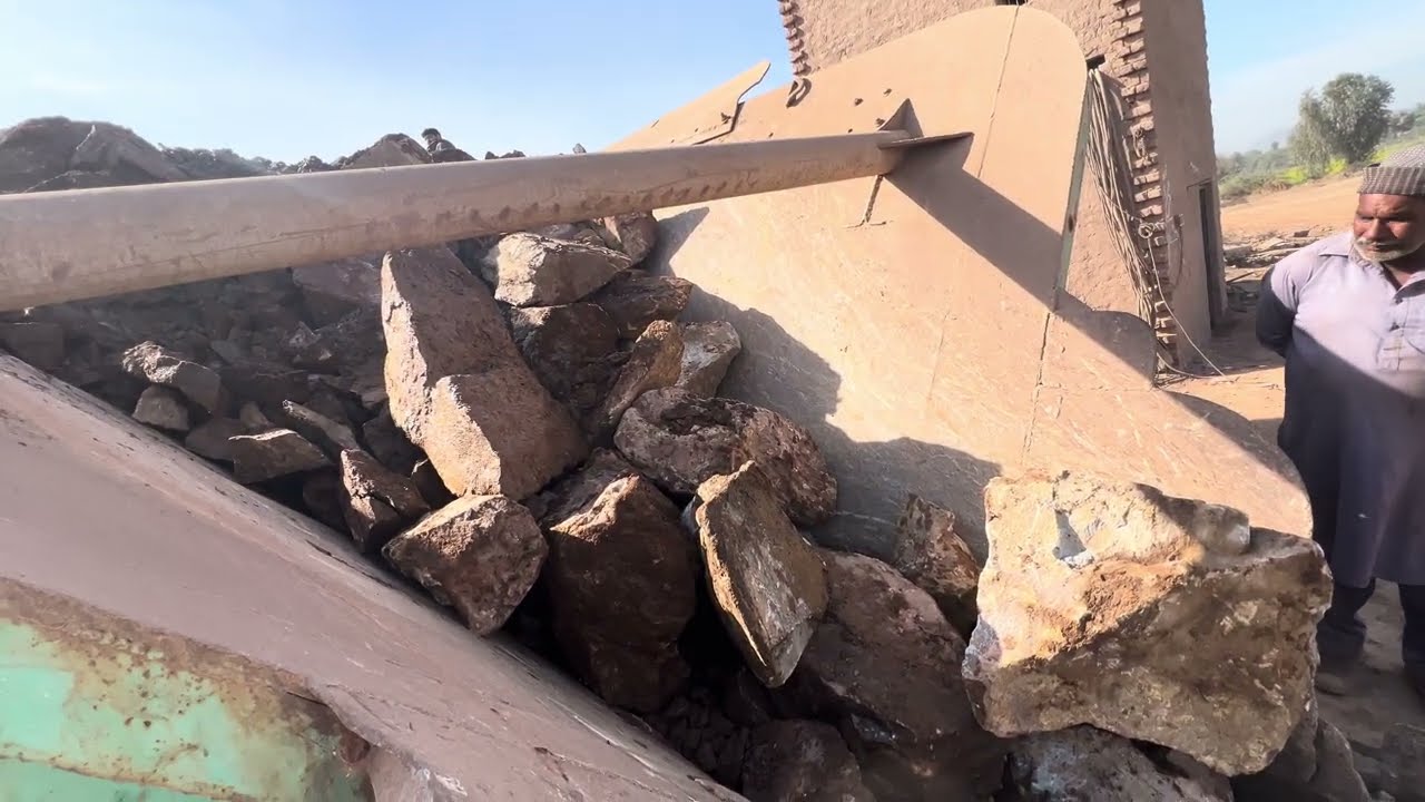 "Stone Crusher Machine: A Giant at Work"The Power of Stone: Machine Working in Action"