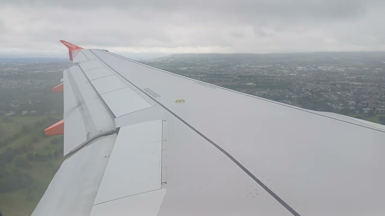 EasyJet Airbus A320 cloudy arrival into Edinburgh Airport