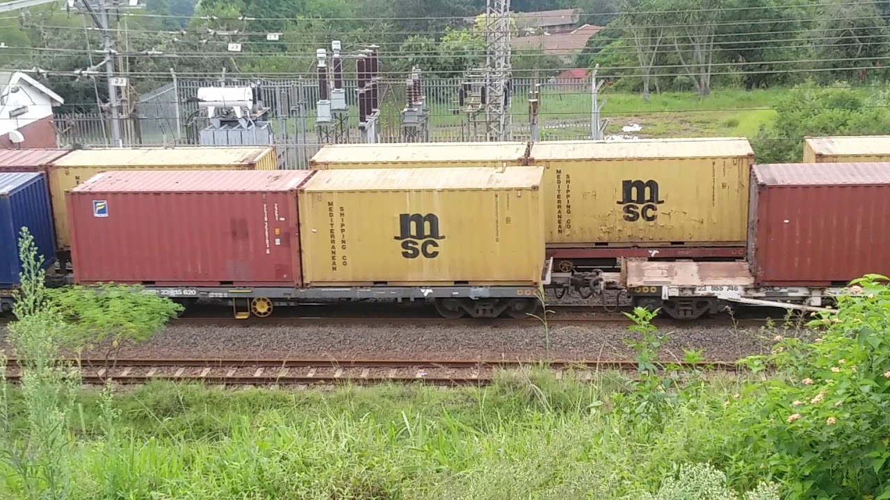 three 18 E locos with container train going through Boughton junction