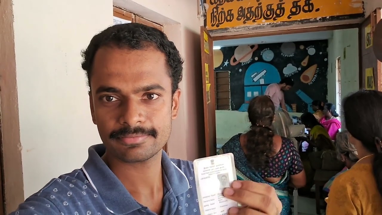 wauting at polling booth queue