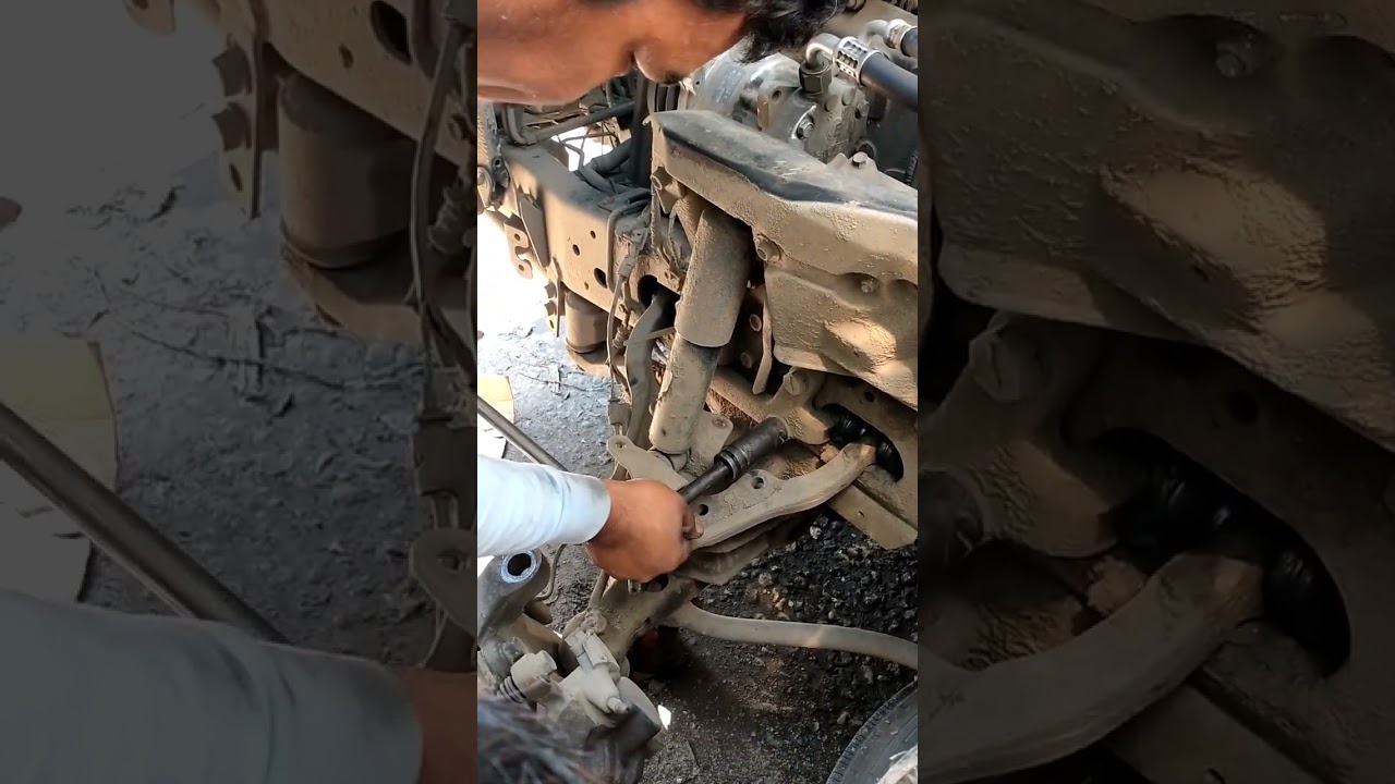 replace swing arm assembly isuzu elf