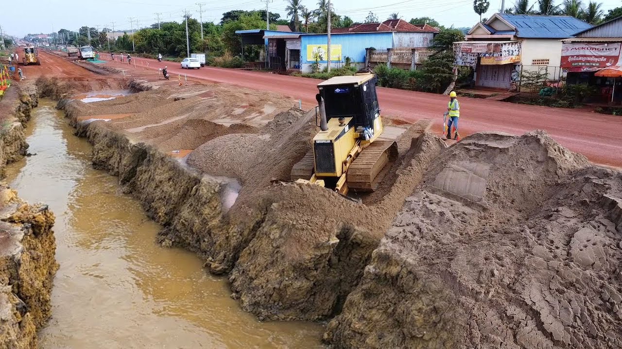 Wow Unbelievable!! Amazing road project, never thought a bulldozer could do it.
