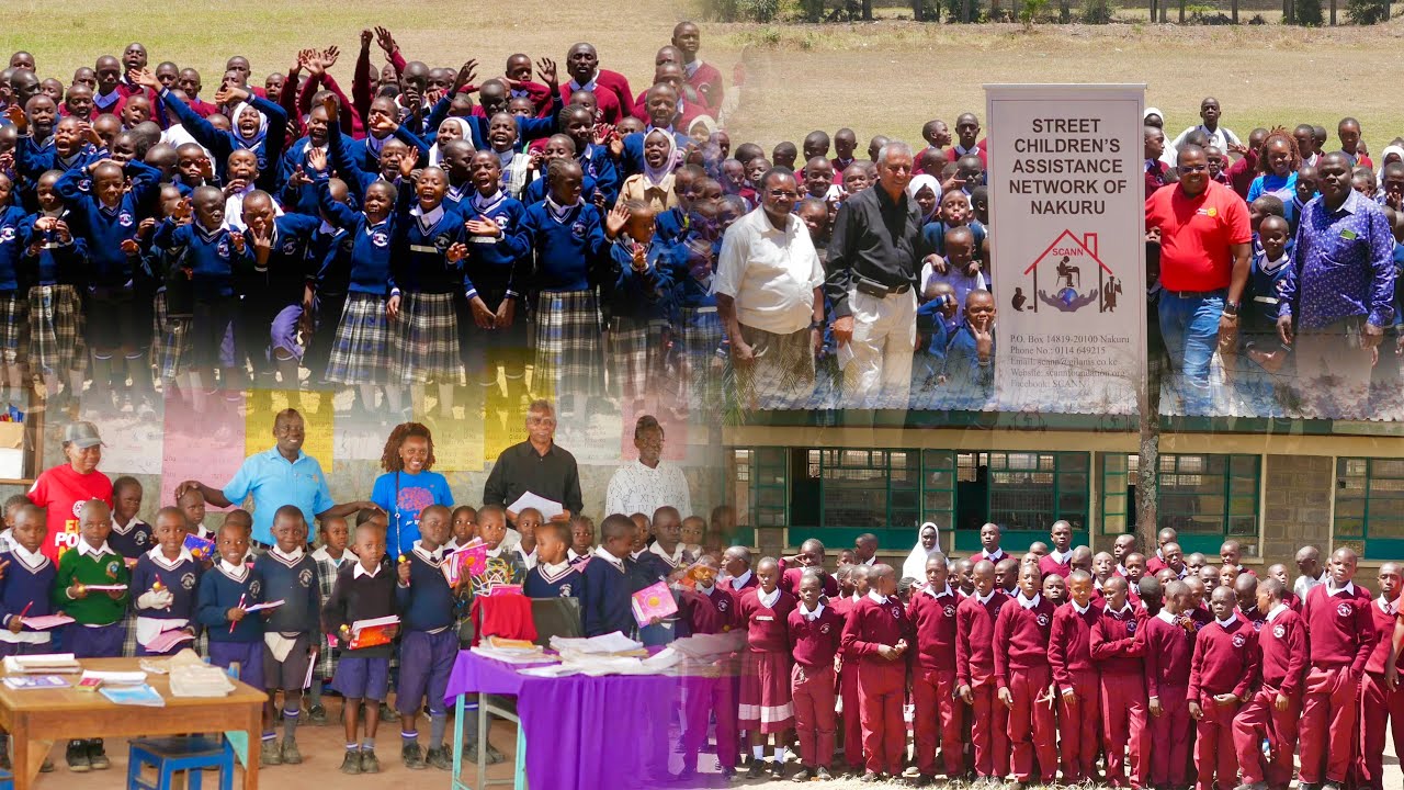 SCANN distributing school uniforms, stationeries to the needy students at kisulisuli primary