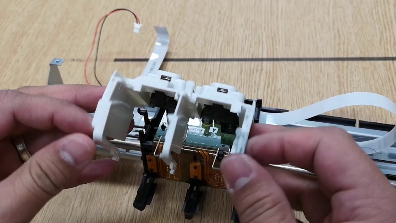 Remove Carraige PCA from Carriage Assembly