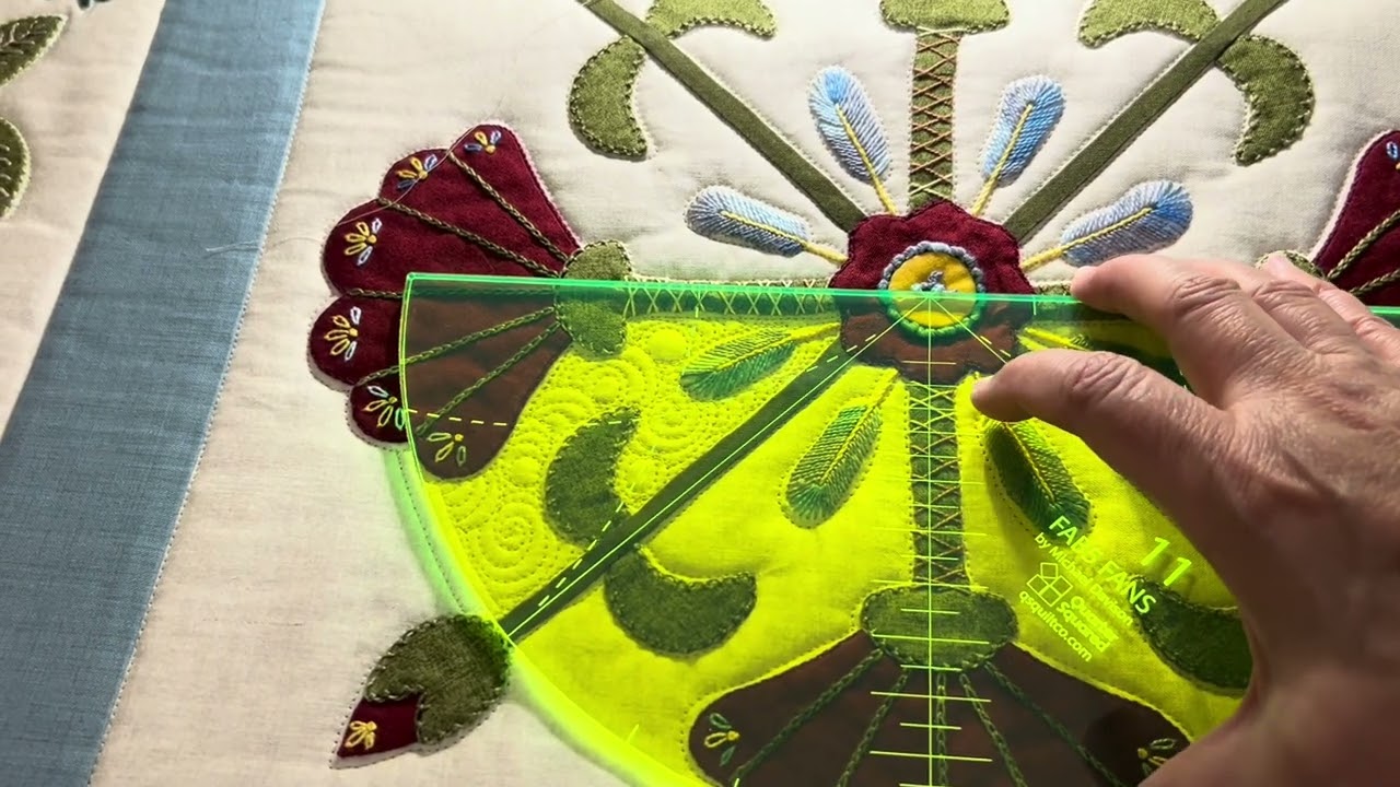 Background quilting on appliqué and embroidery