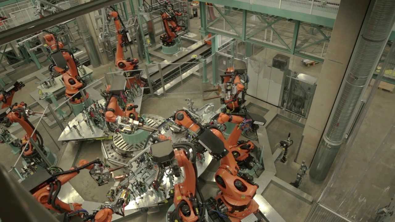 EXPERT-TÜNKERS: Drehtisch mit zentraler Roboteranordnung